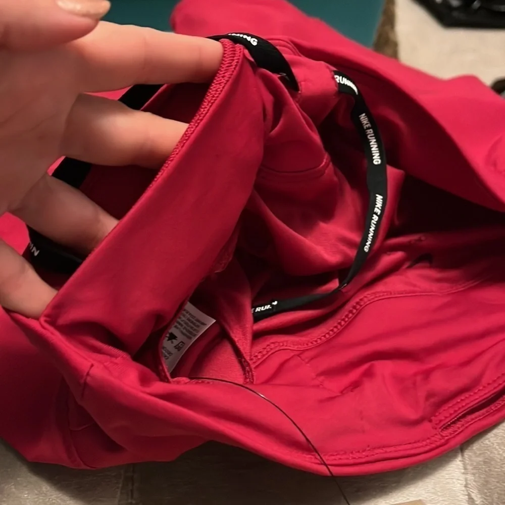 Nike raspberry colored Dri-Fit running shorts, medium, new